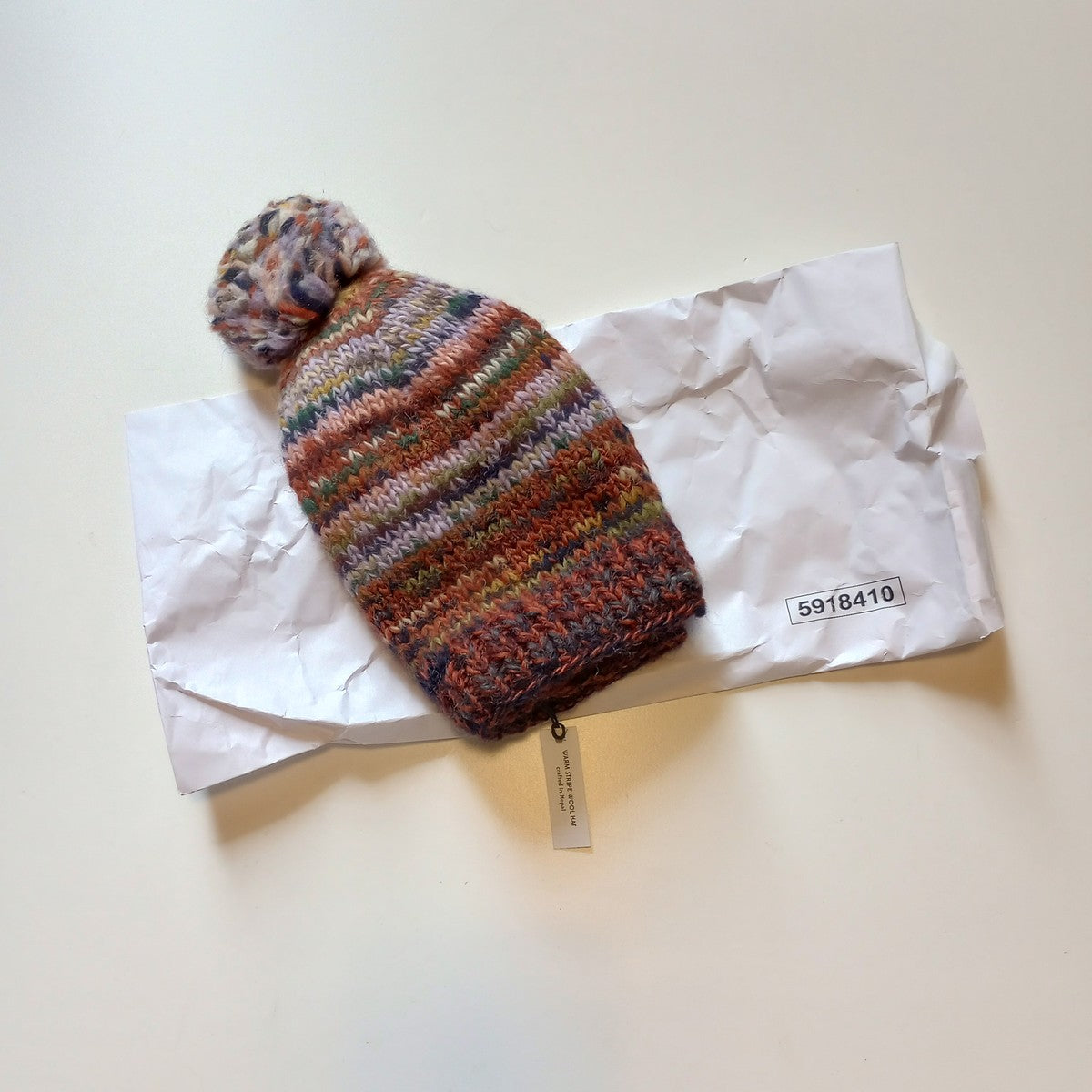 Hat w/pompom lined remnant wool/poly 9Dx9H rd/asst