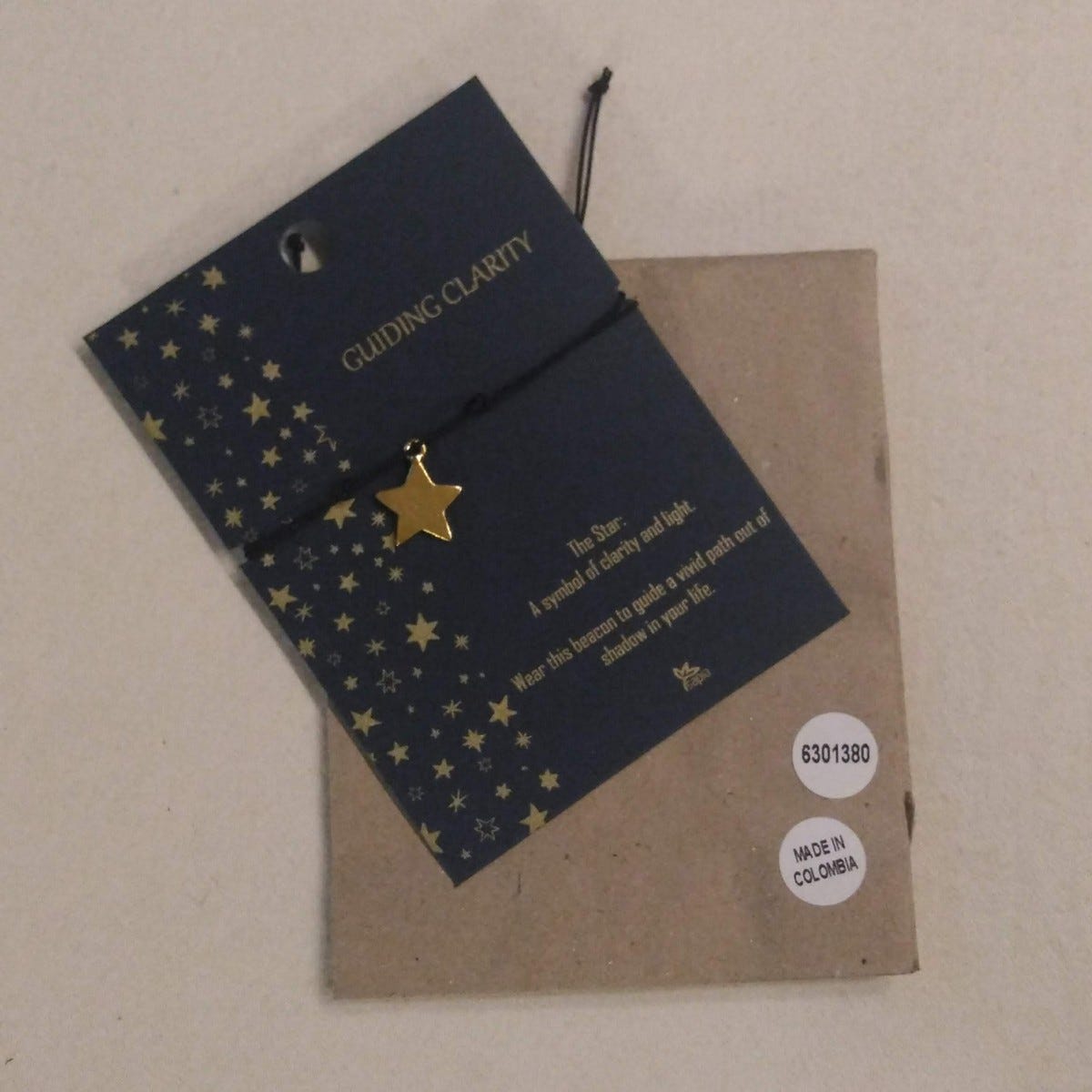 Bracelet star charm w/card gold/cord .5D gold