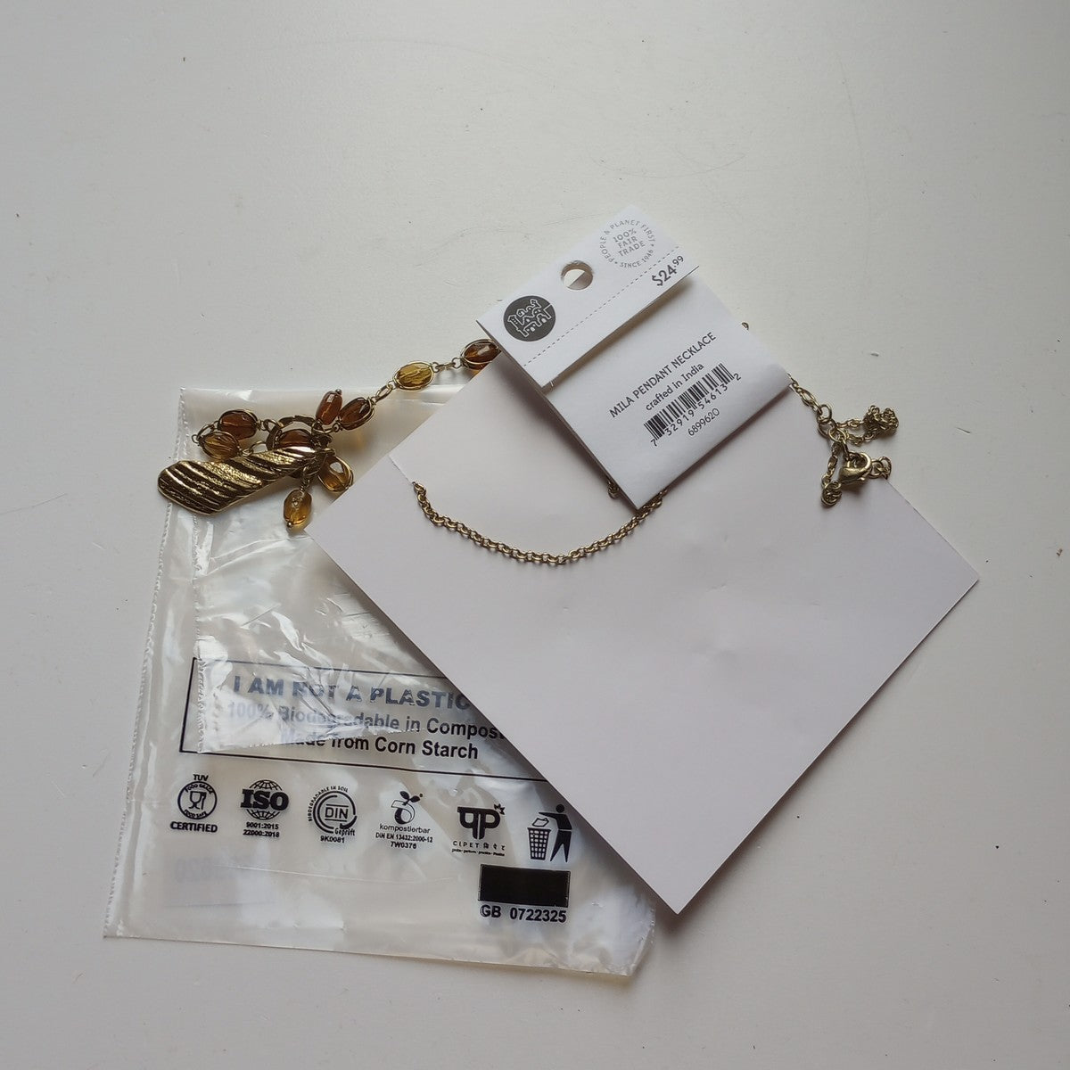 Necklace bead w/pendant br/glss 24L yel/brn/brass