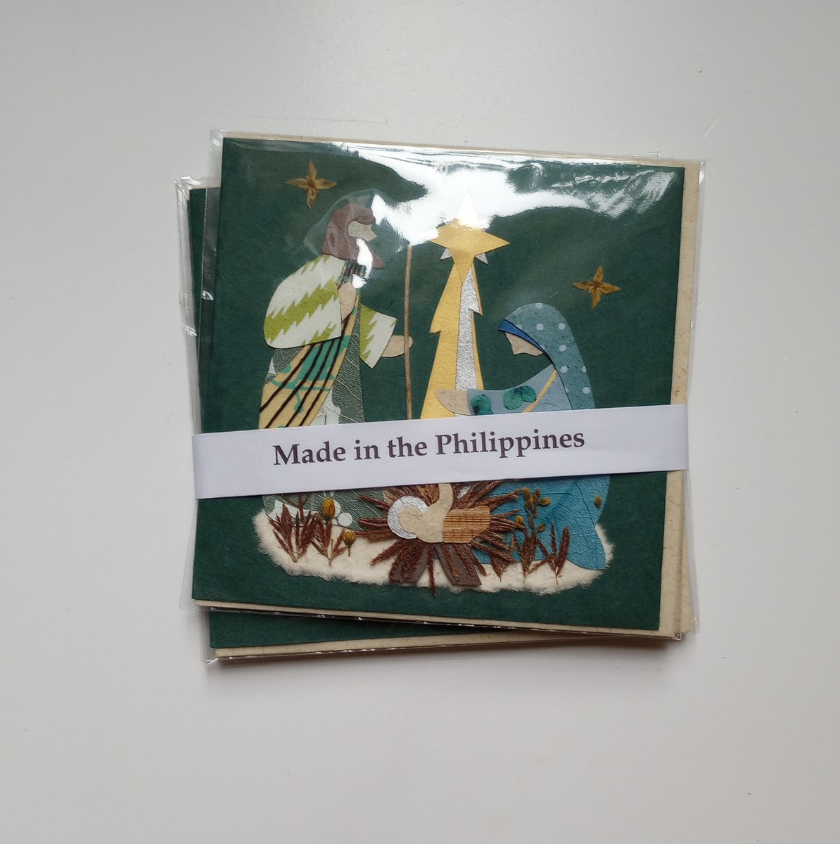 Card nativity M/3 ppr/flowers 5.5sq grn/yel/multi