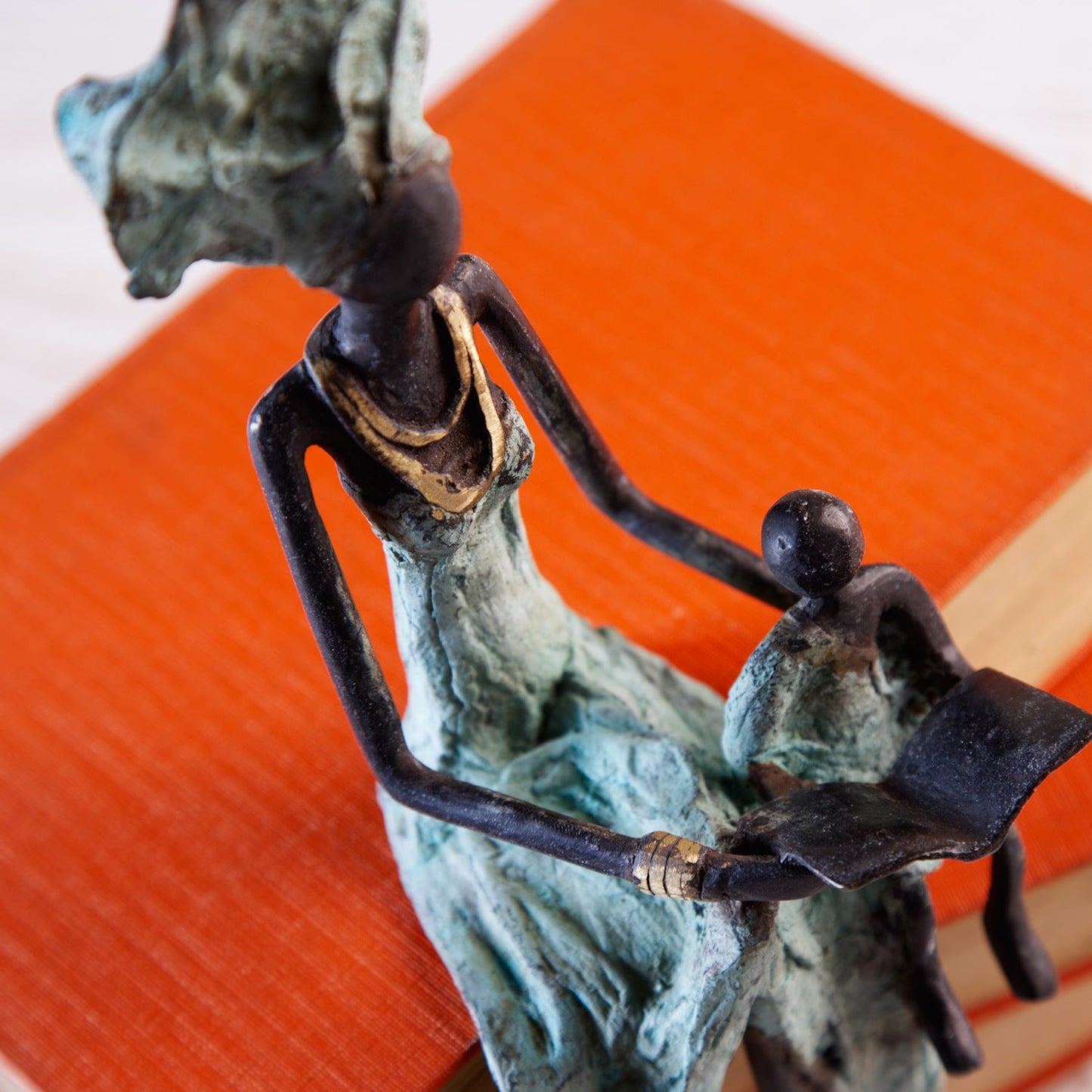 Mother/child/book bronze blk/grn
