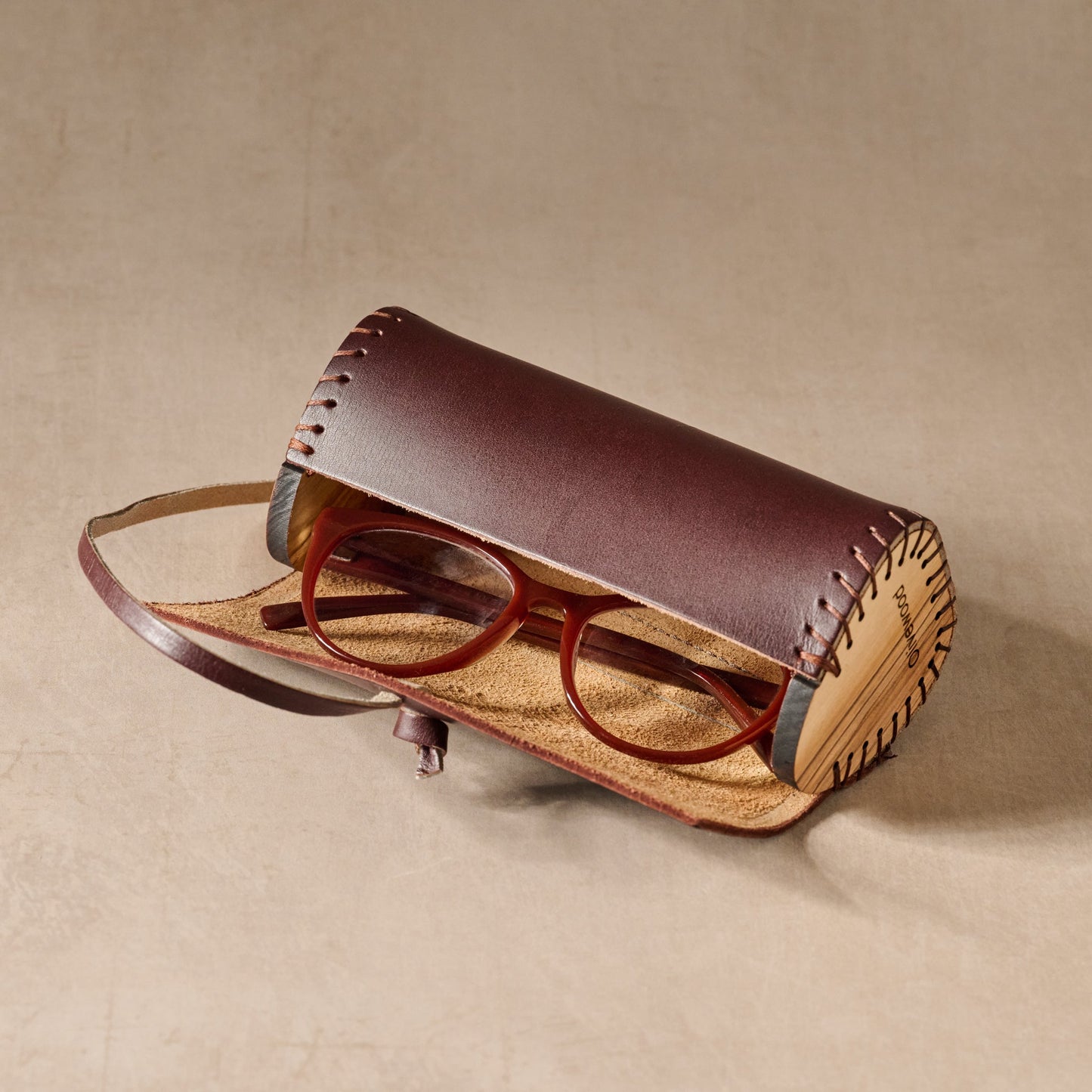 Eyeglass case round w/wrap lthr/olive wd 6Lx2.5D
