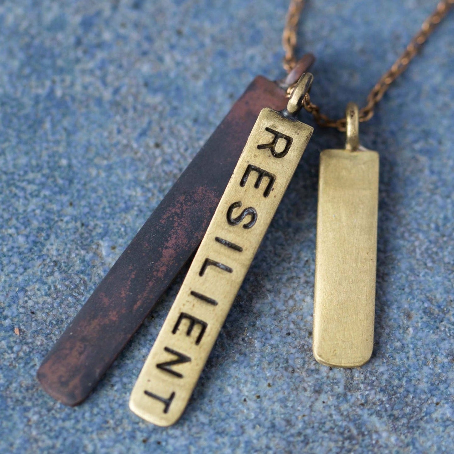 Necklace 3 bars RESILIENT pend 32L gold/black