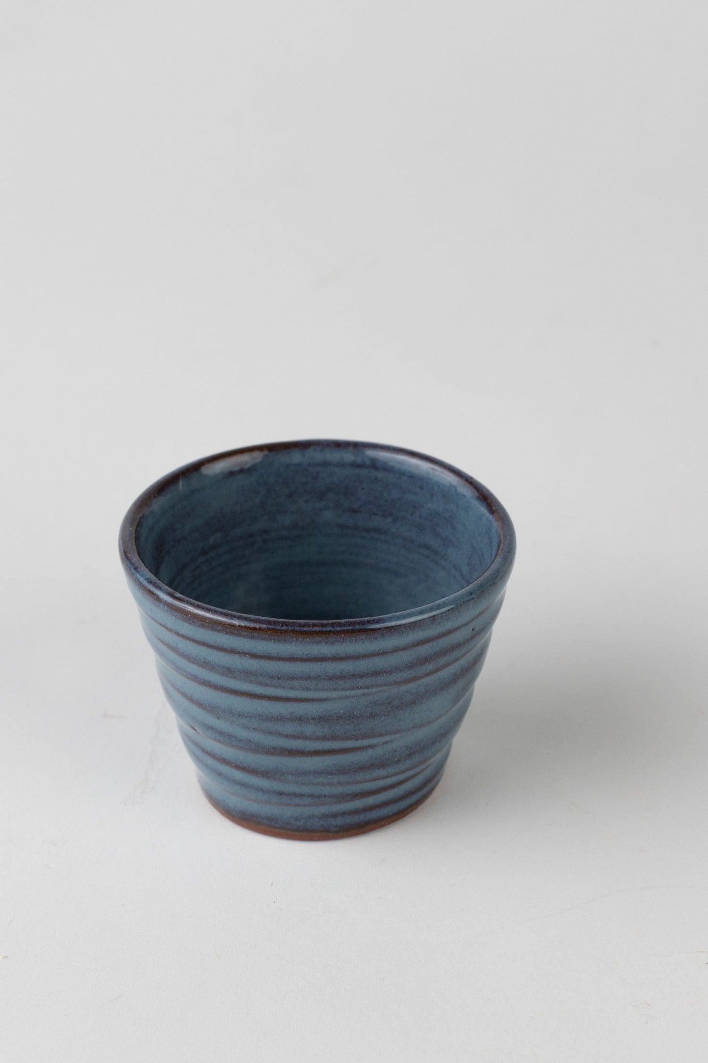 Cup sake scored M/2 1.5oz cer 2.25Dx1.75H blu/brn