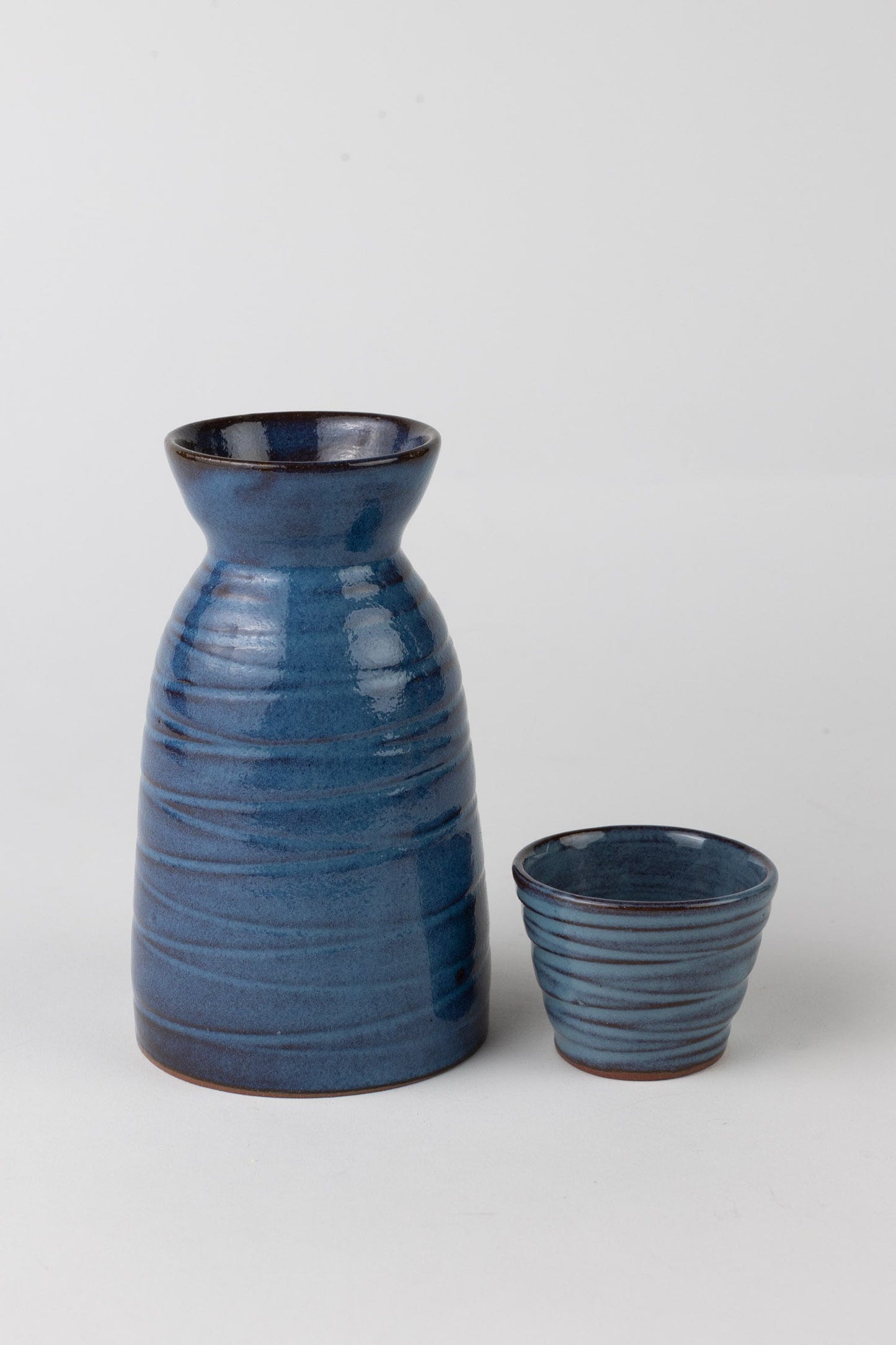 Cup sake scored M/2 1.5oz cer 2.25Dx1.75H blu/brn