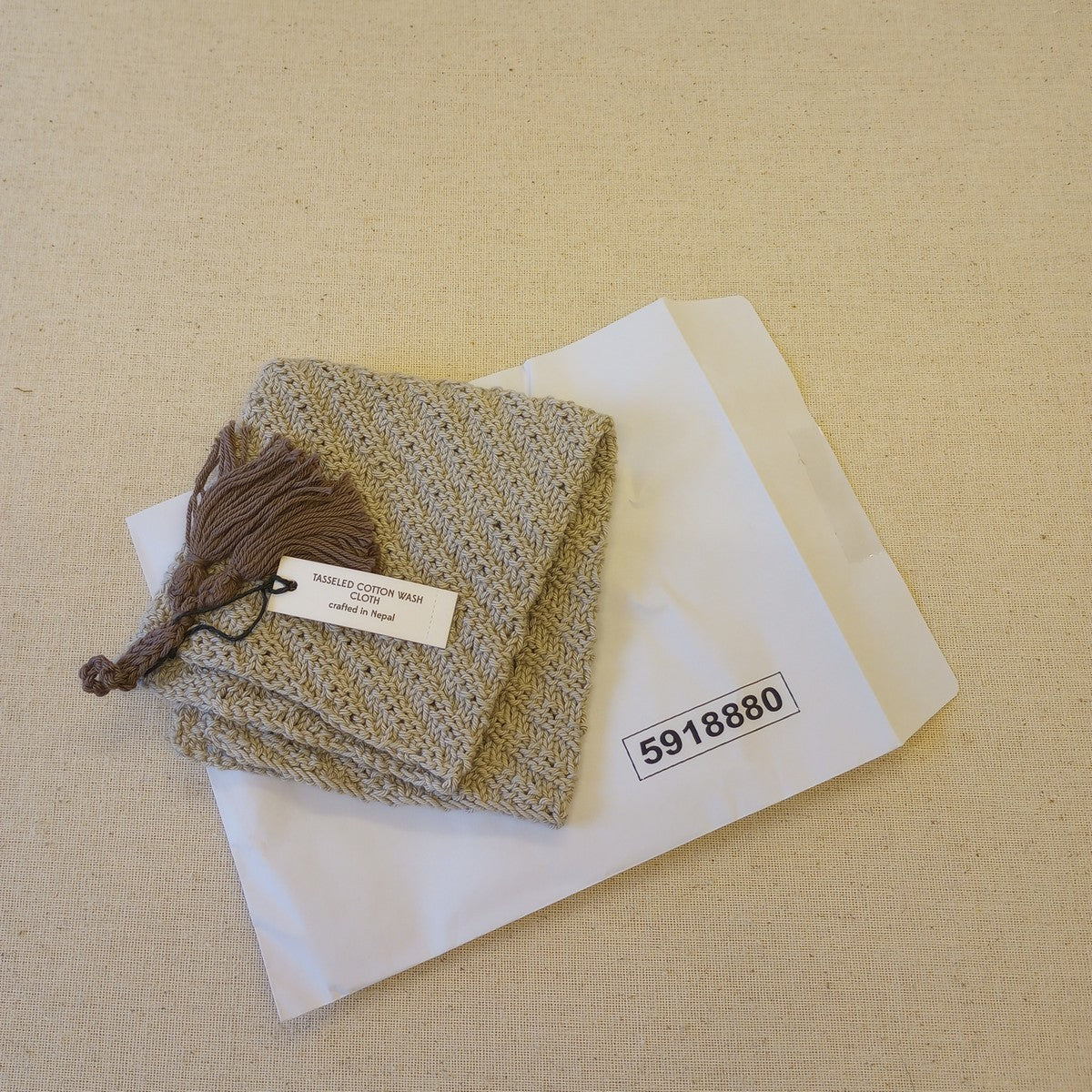 Wash cloth w/tassel diagonal knit cttn 9sq gry/brn
