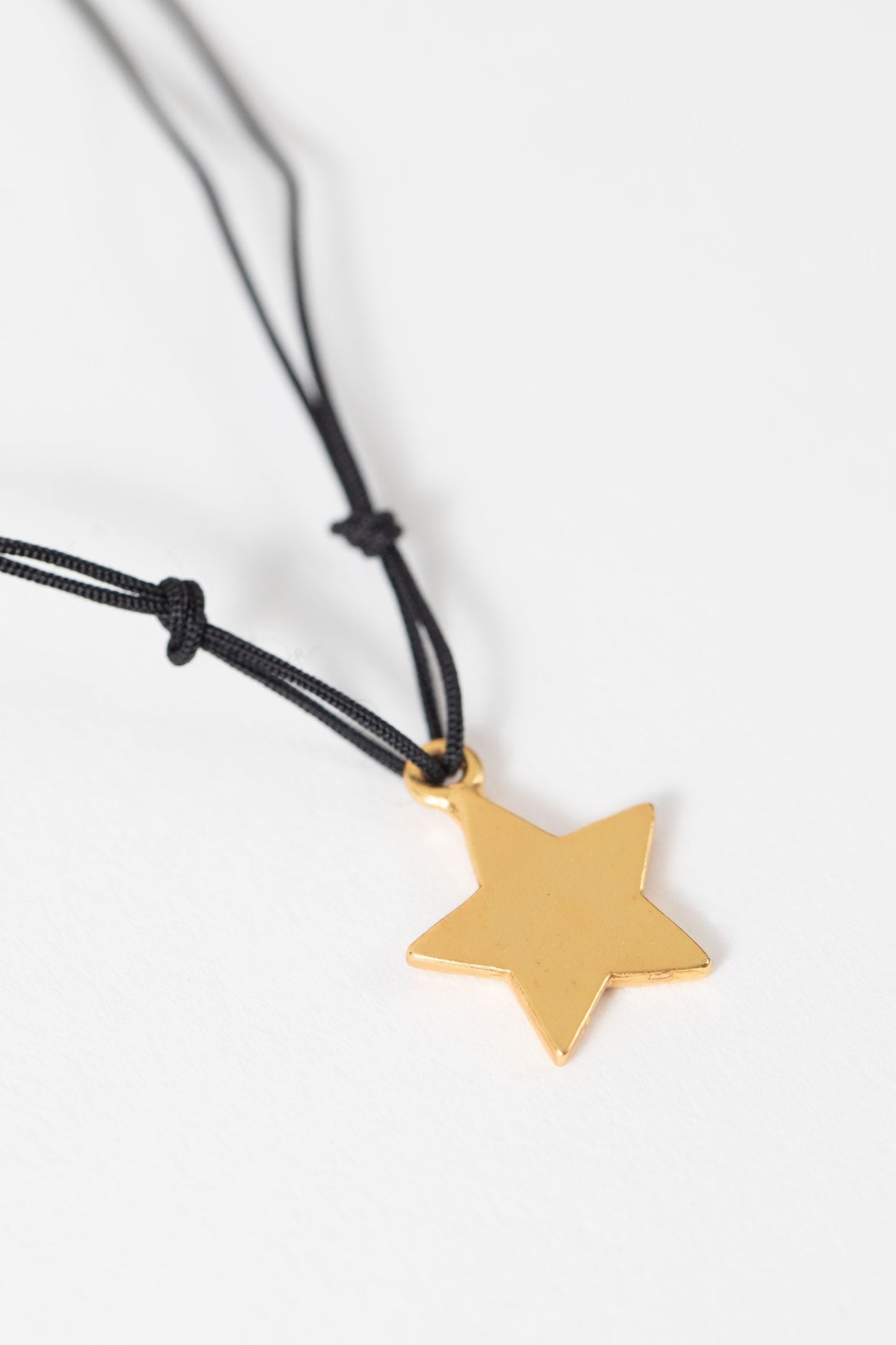 Bracelet star charm w/card gold/cord .5D gold