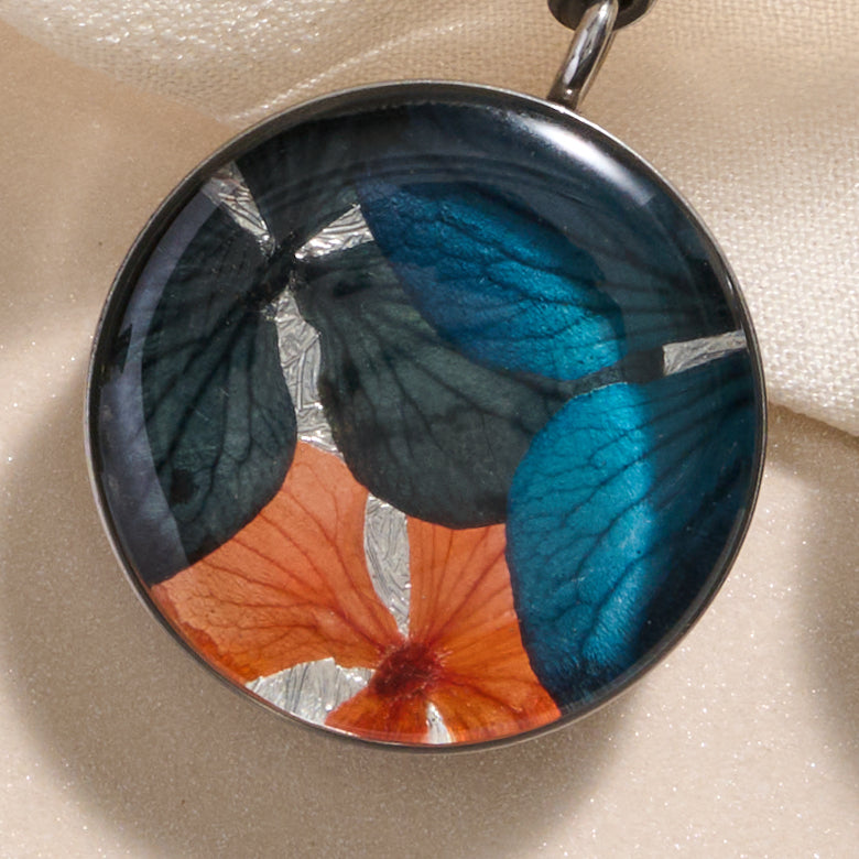 Earrings drop petals steel/resin 1.25L silv/blue