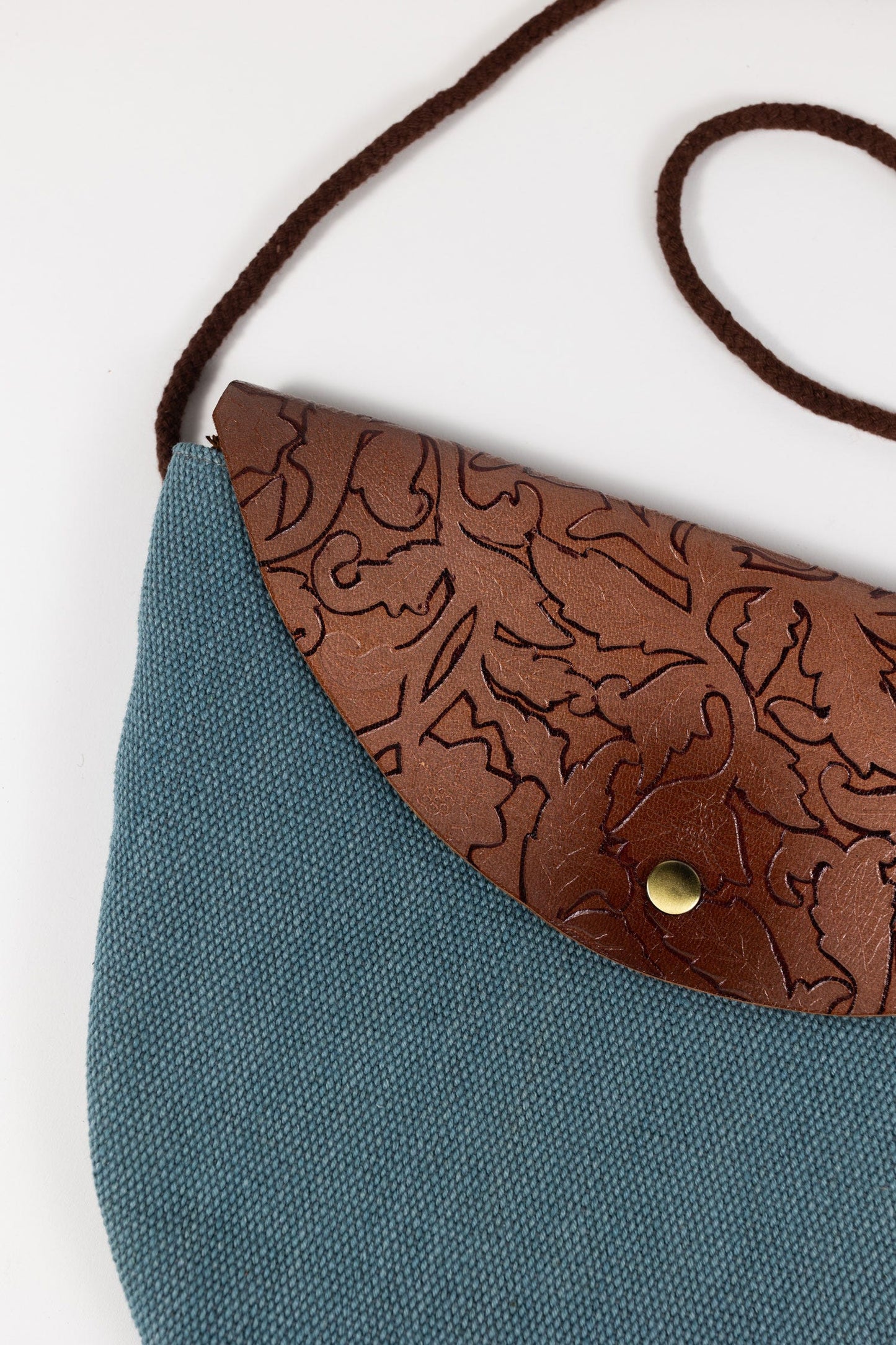 Purse half crcl Shanti lthr/canvas 12Wx10H blu/brn