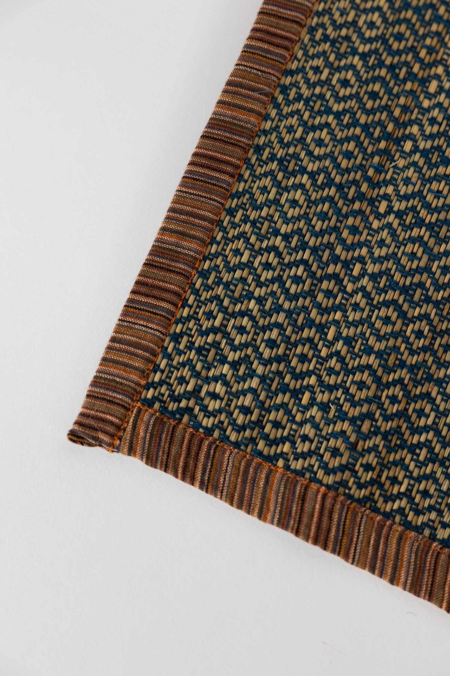 Placemat bound M/2 woven grass 20x14 brn/dk teal