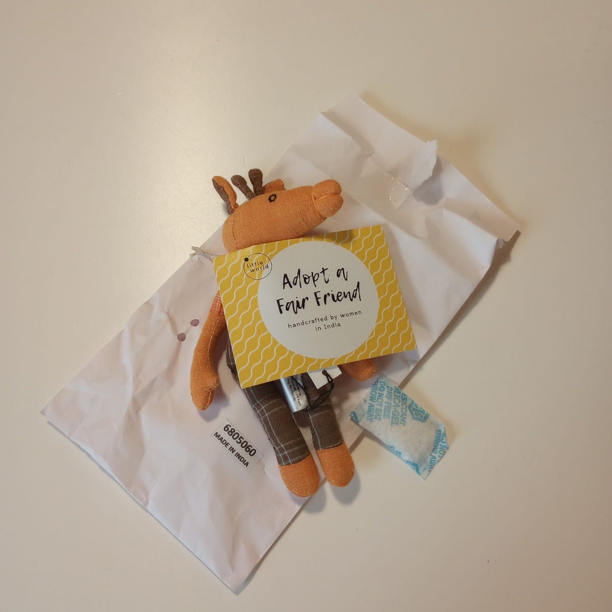 Giraffe w/adoption card stuffed cotton 7H orng/brn