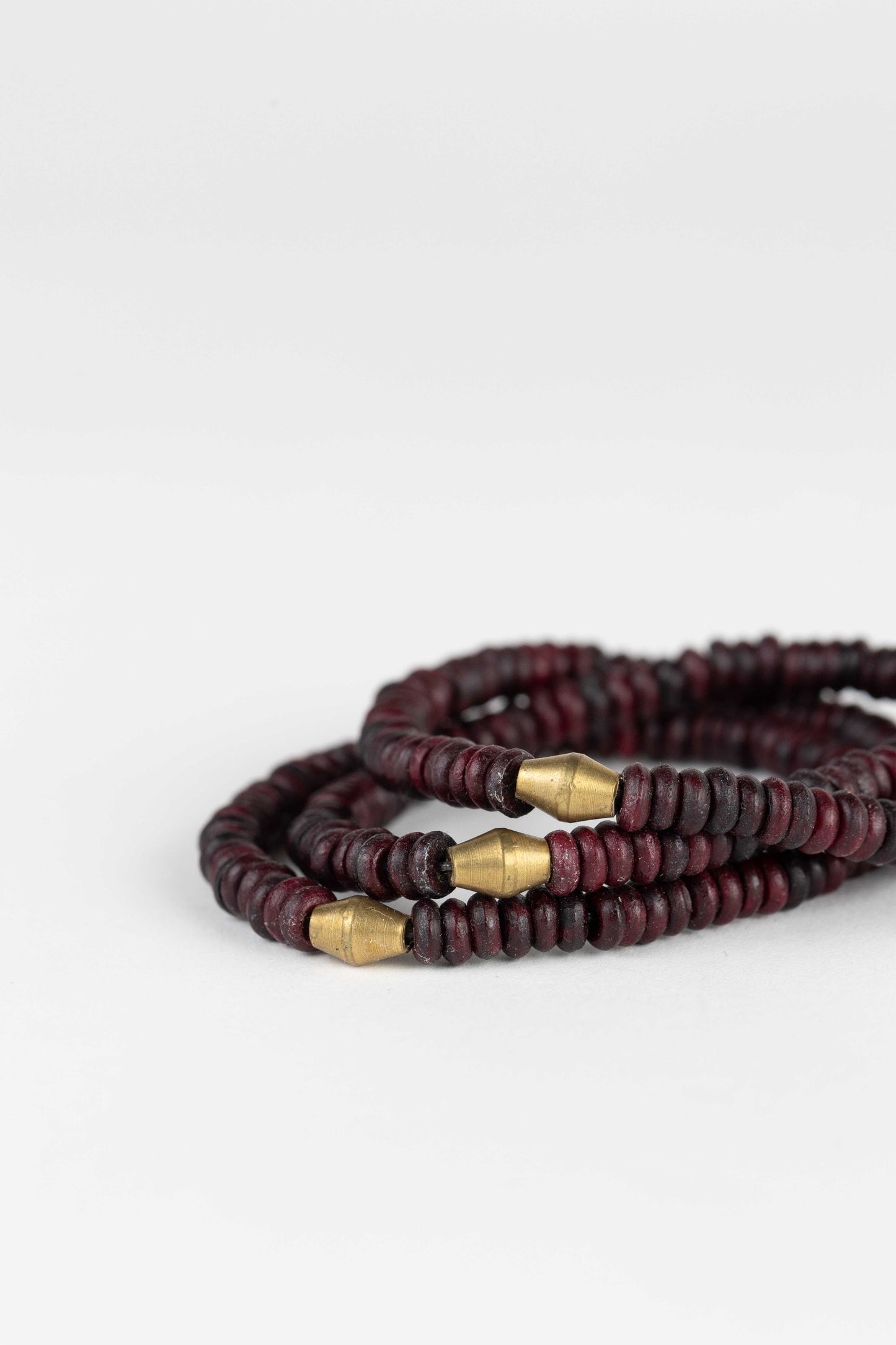 Bracelet stretchy trio bone/metal 2.5D reddish brn