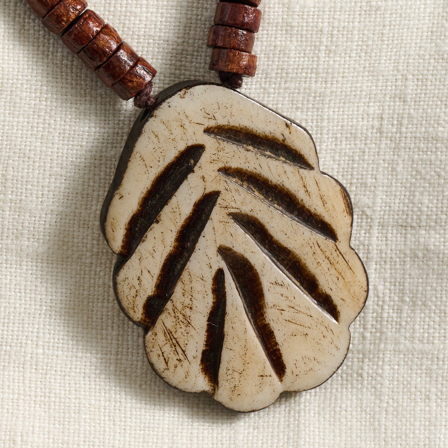 Necklace pend sm beads bone/wood/cord brn/tan