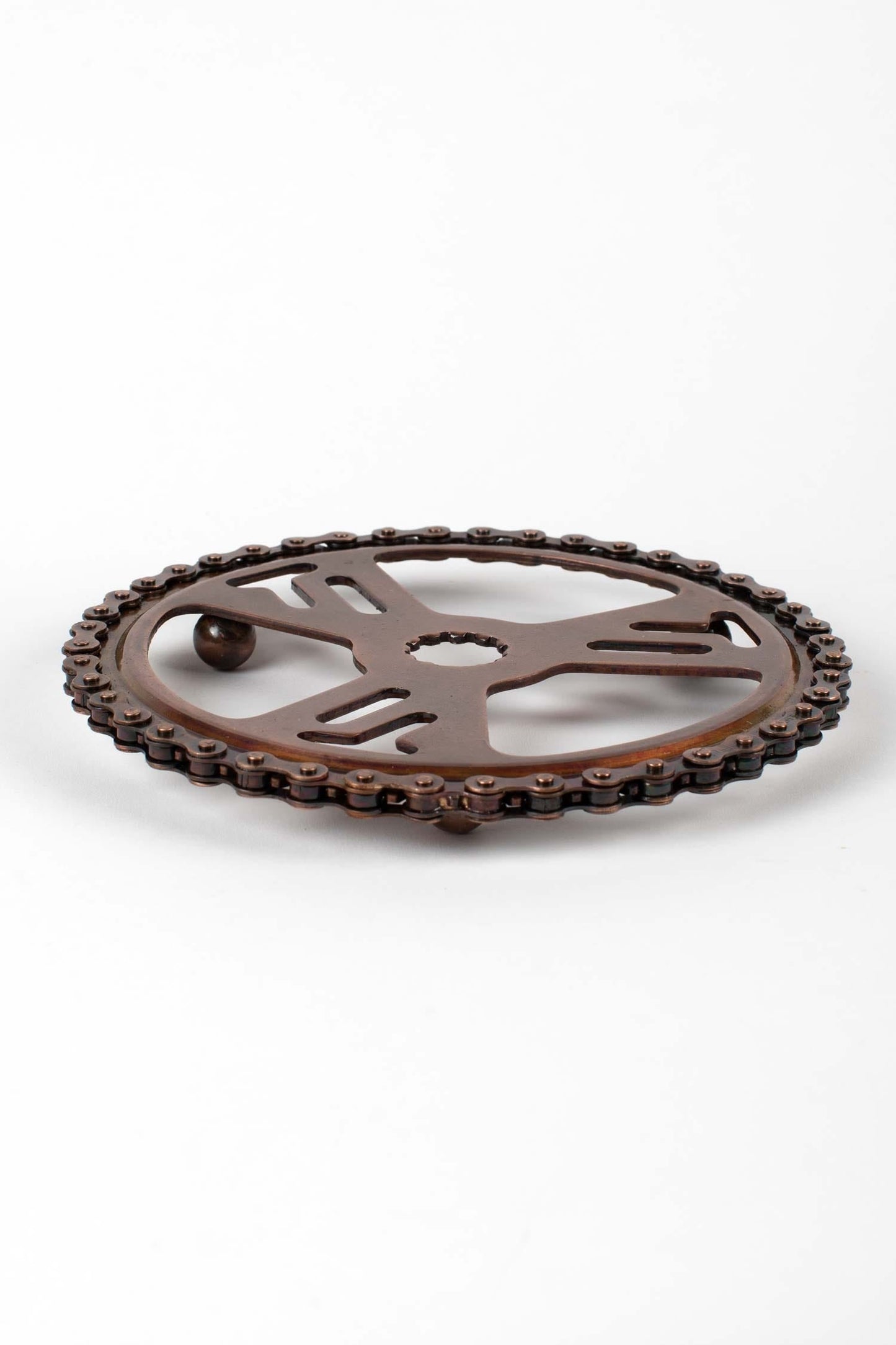 Trivet bike chain/gear metal 7.25Dx.75H bronze