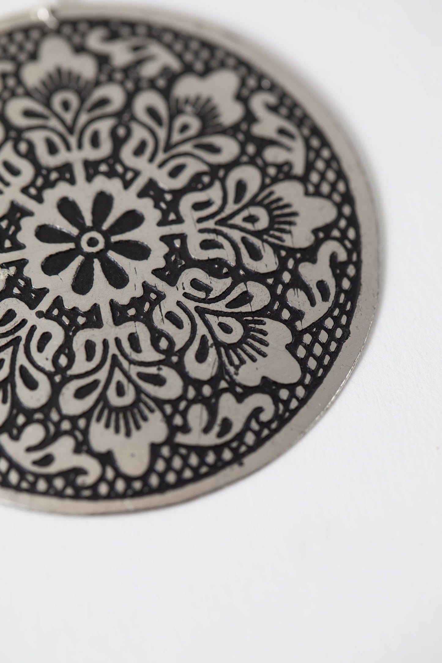 Earrings large disc embossed metal 2D silver/black