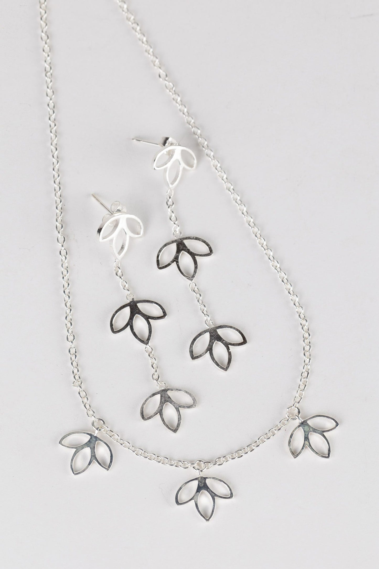 Earrings post lotus trio drop brass 2.25L silver