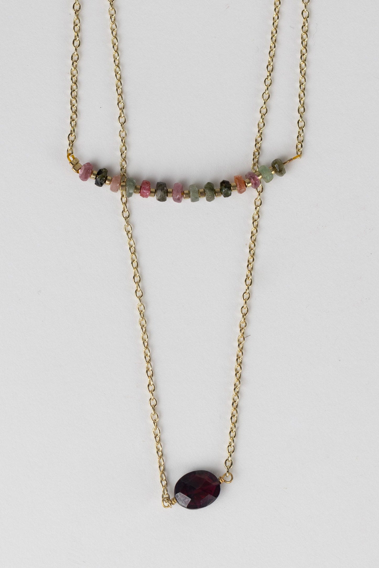 Necklace 2 strand tourmaline/garnet 18L gld/wine
