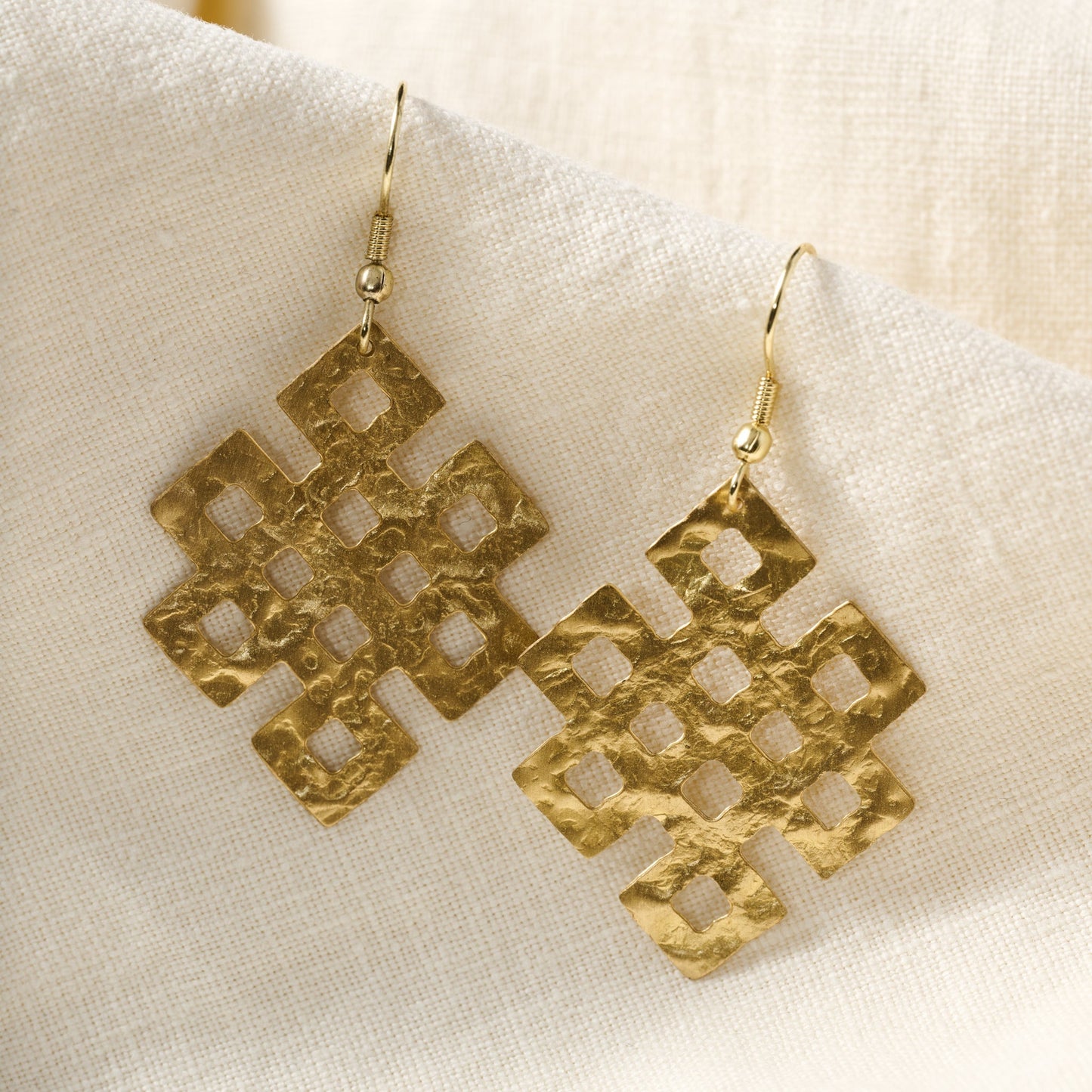 Earrings endless knot hammered brass 2.25L gold