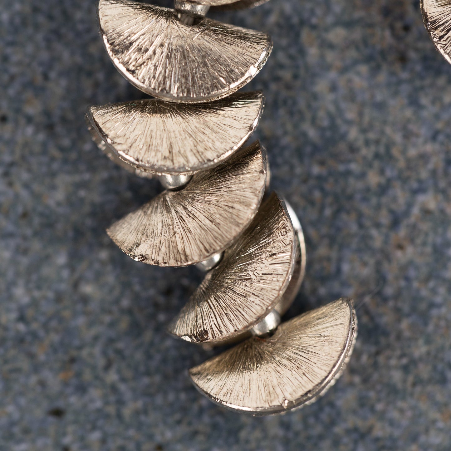 Earrings dangle stacked folds crcl cppr 2.25L silv