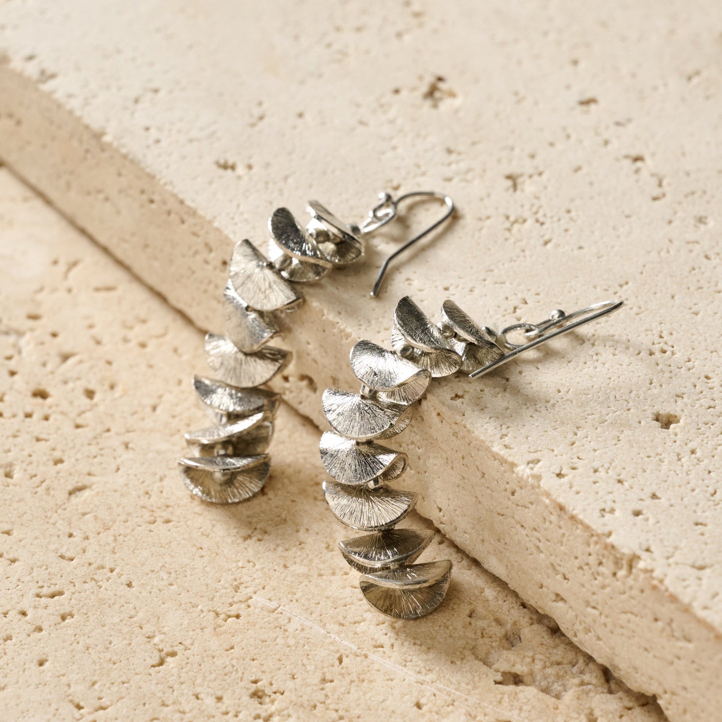 Earrings dangle stacked folds crcl cppr 2.25L silv