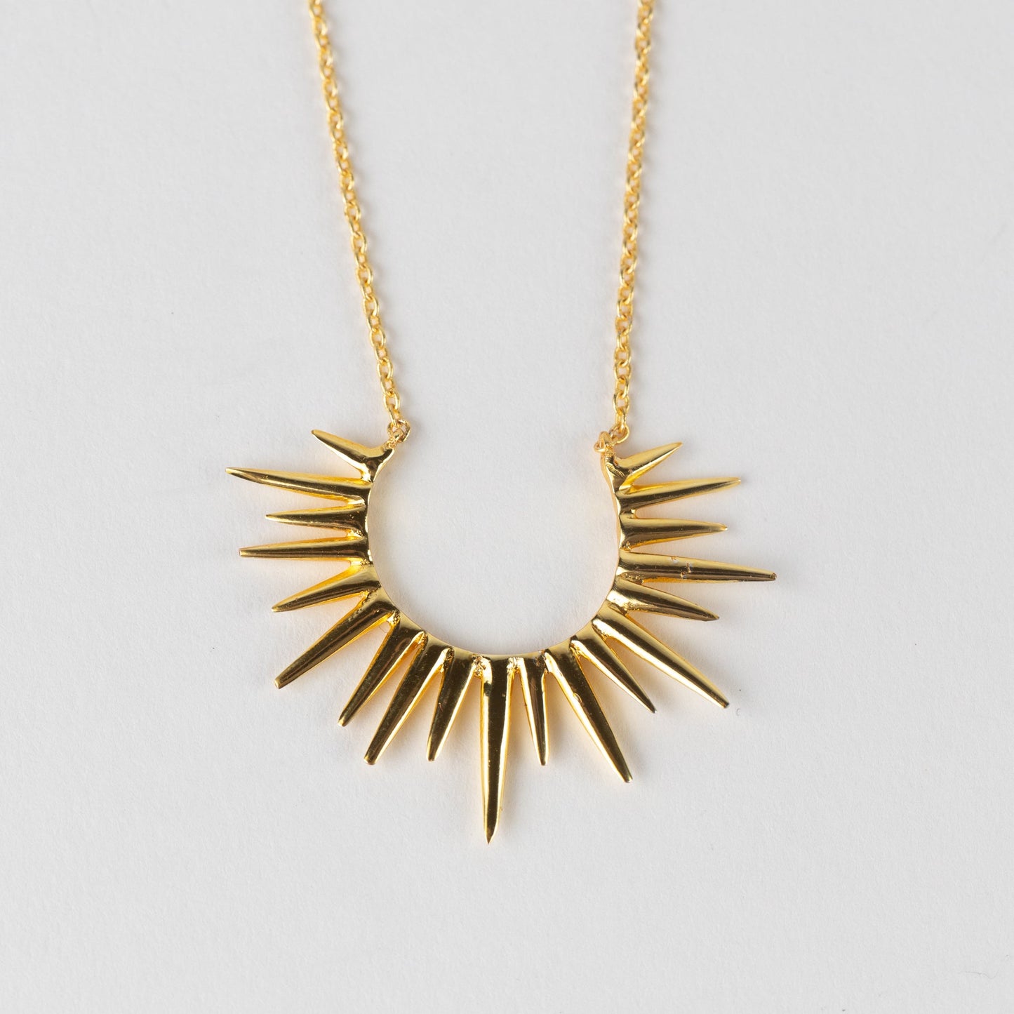 Necklace sunburst brass/gold plated 16L gold