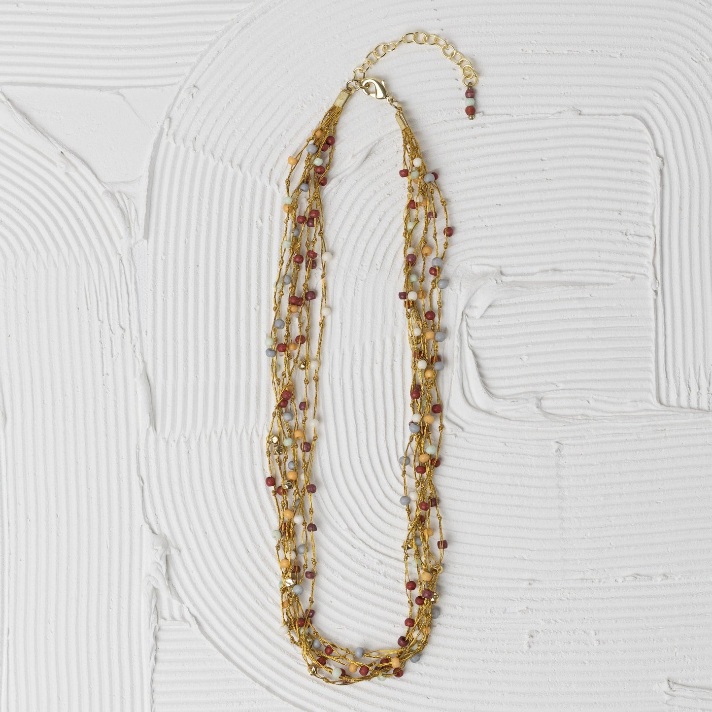 Necklace multistrnd bd bone/zari 17L br/wht/orng