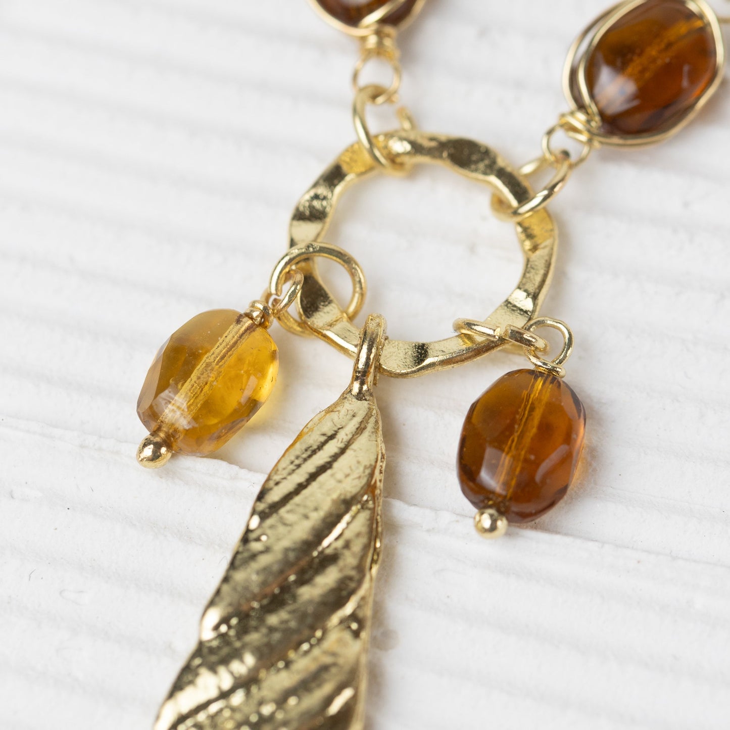 Necklace bead w/pendant br/glss 24L yel/brn/brass
