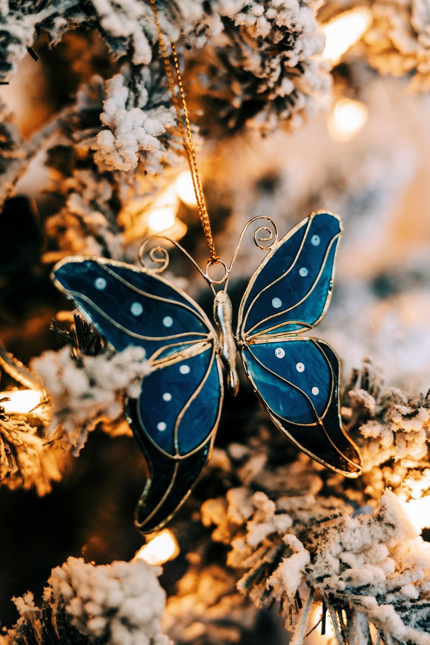 Ornament butterfly capiz 3.25Wx3H blue/black/gold