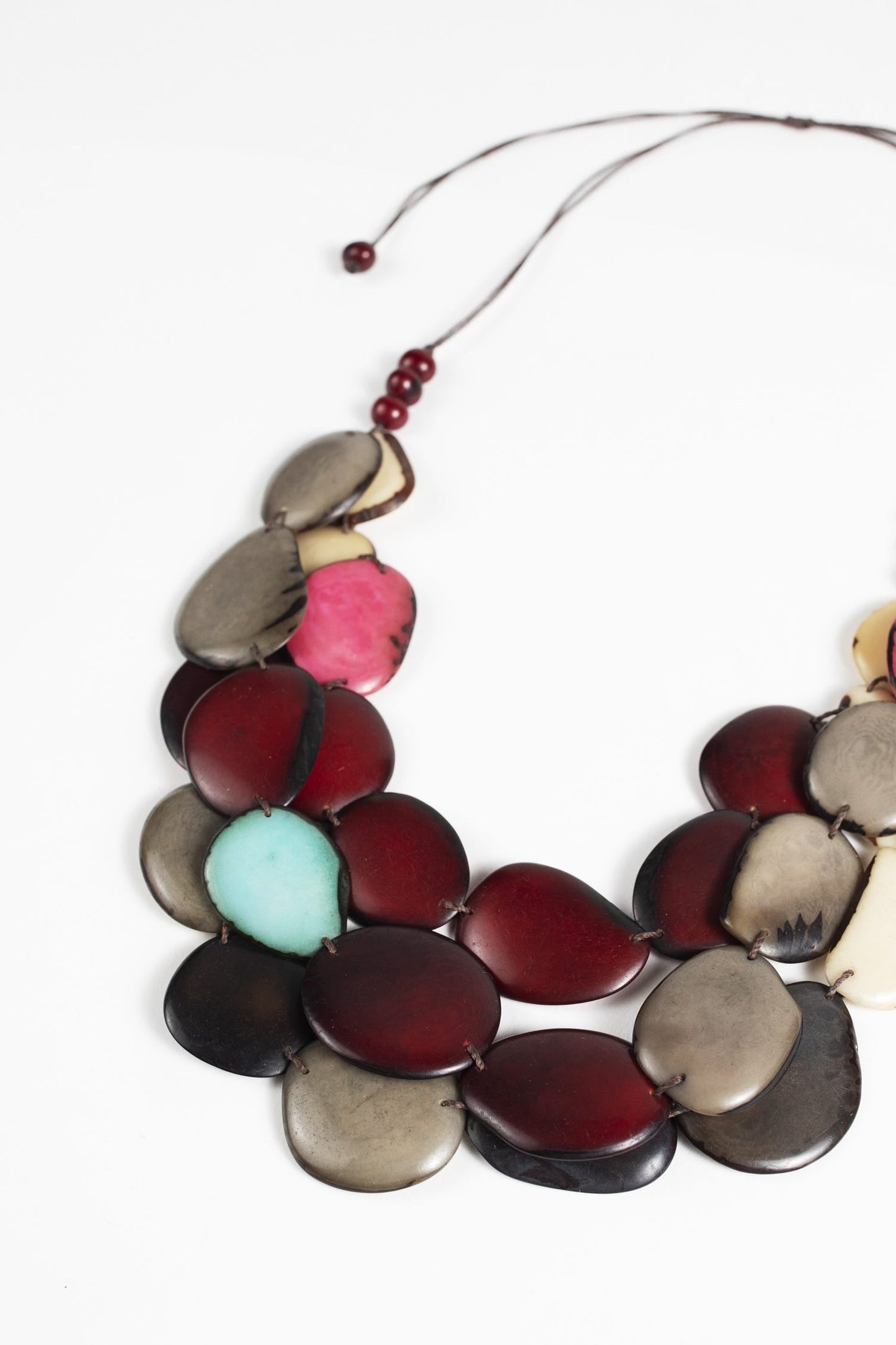 Necklace 3 tier linked tagua/cttn 34L red/brn/teal