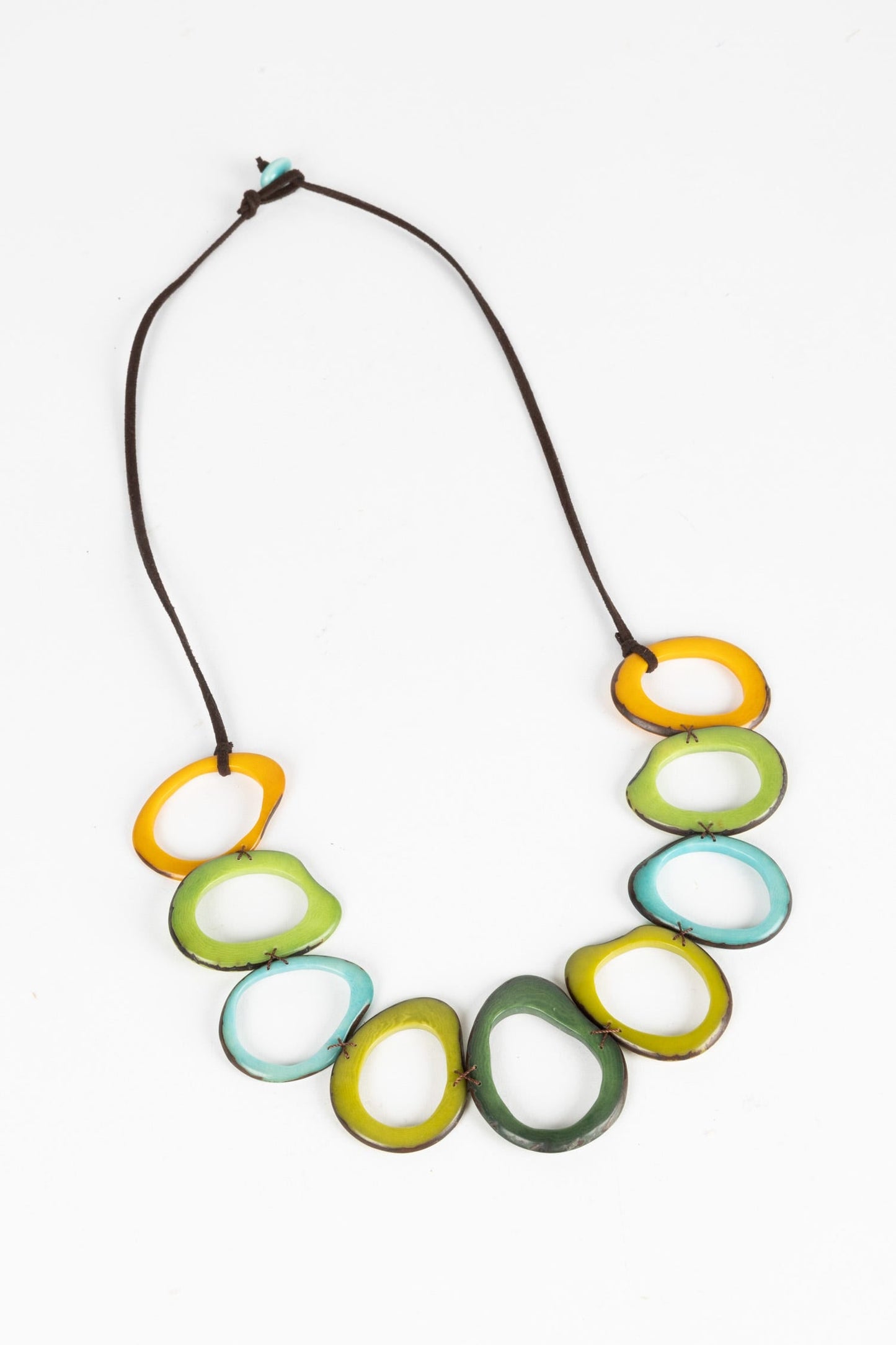 Necklace 9 linked open oval tagua/lthr 26L grn/yel