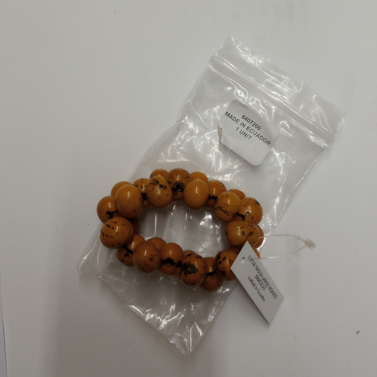 Bracelet large round beads tagua adj yellow/black