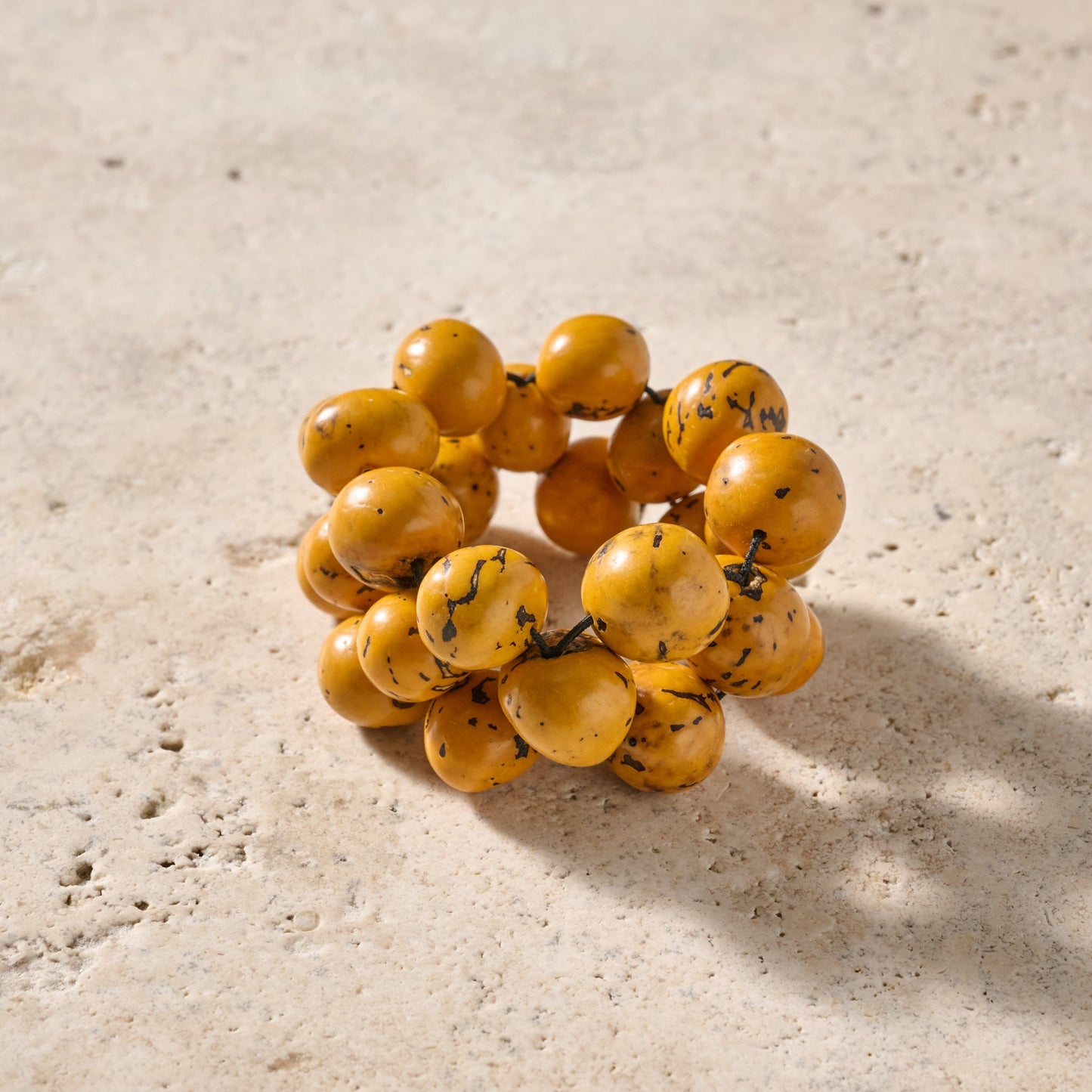 Bracelet large round beads tagua adj yellow/black