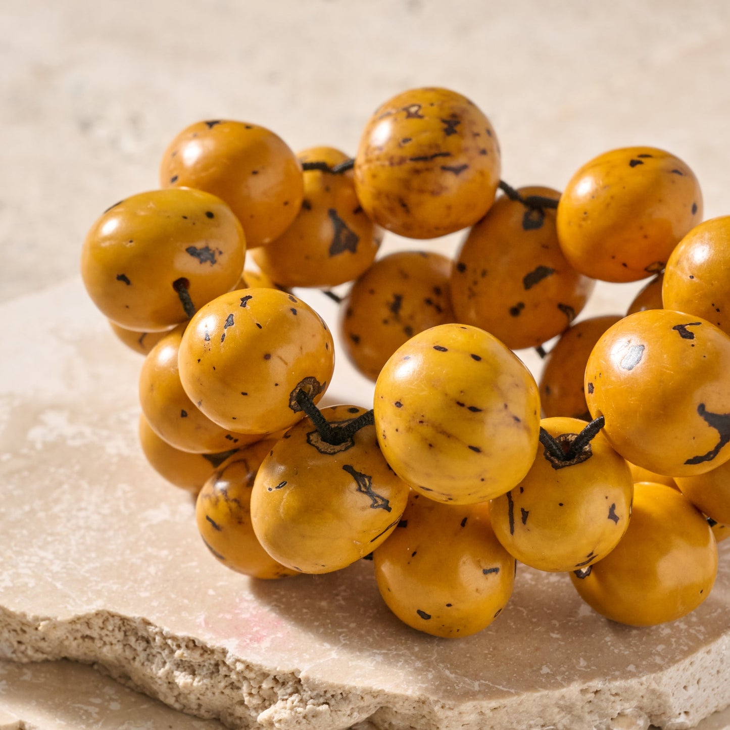 Bracelet large round beads tagua adj yellow/black