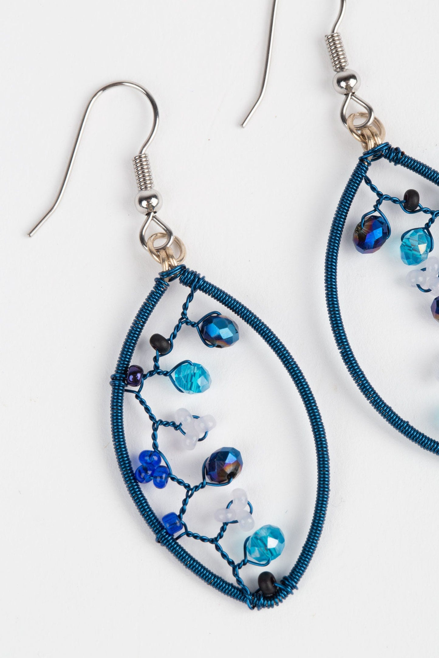 Earrings oval wire wrap/inner beads 2.25L blues